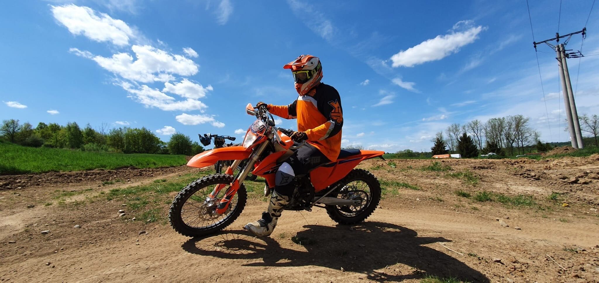 A perosn riding a motor bike.