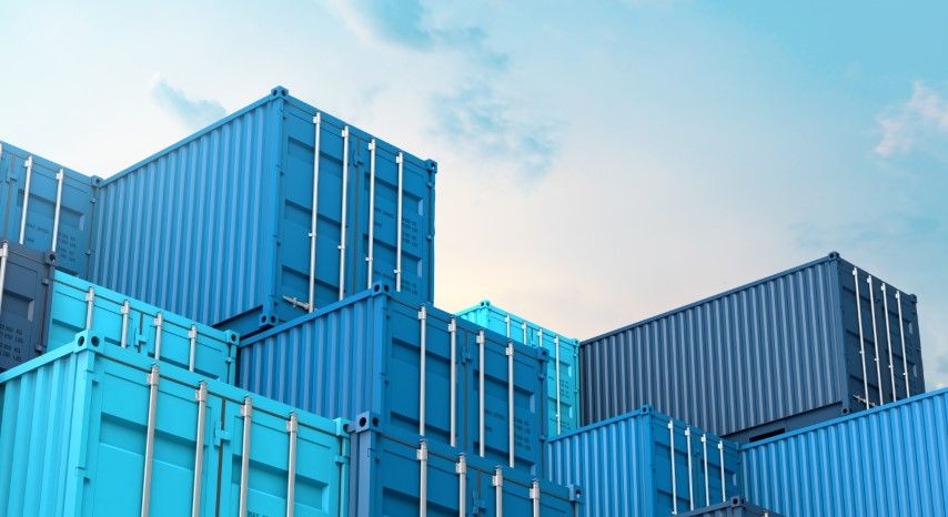 Python on Docker: blue shipping containers stacked to resonate with setting up the Docker environment