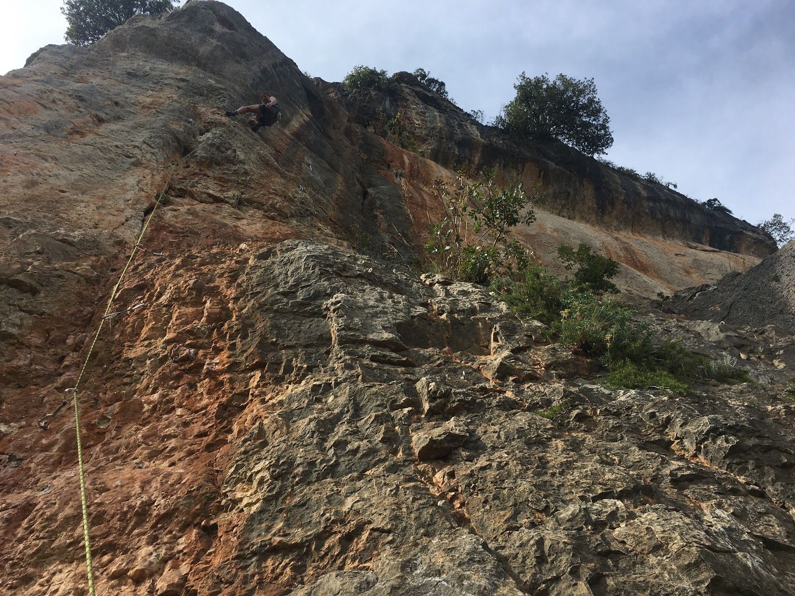 woman climbing rocks